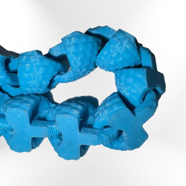 Scaled Fidget Snake: Blue 3D-printed fidget toy, interlocking cross-shaped segments for stress and anxiety relief.