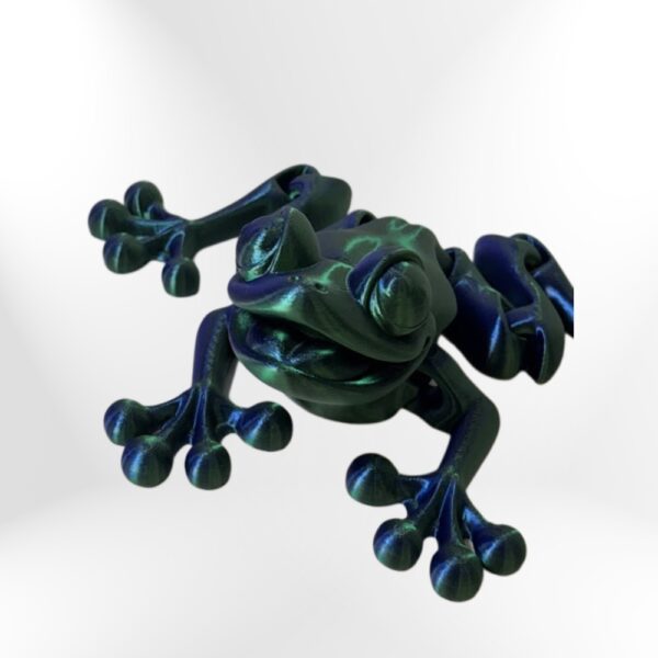 3D-printed iridescent frog figurine, green and blue, detailed texture