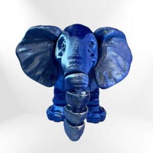 Blue 3D-printed elephant figurine holding stacked bowls.