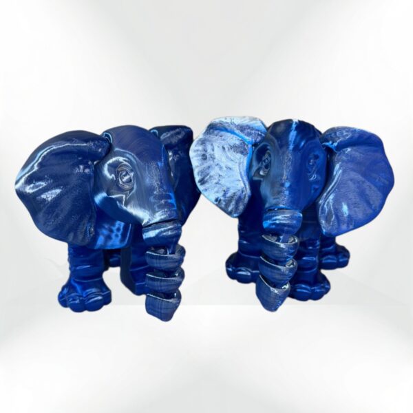 Two 3D-printed blue elephant figurines