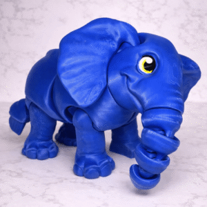 Blue 3D printed elephant toy with curled trunk and cartoon eyes