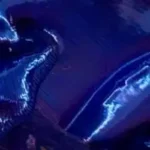 Deep blue iridescent fabric with glossy texture