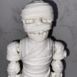 Boo Buddy Mummi: 3D printed mummy figurine, perfect Halloween decoration. Spooky design.