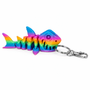 Rainbow-colored 3D printed articulated shark skeleton keychain with metal clasp.