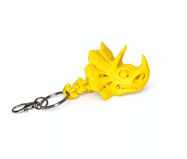 Dinosaur Pack Jurassic World: Yellow triceratops skull keychain with metal ring