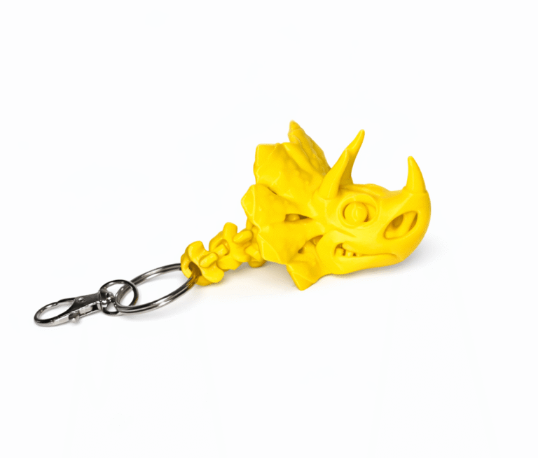 Dinosaur Pack Jurassic World: Yellow triceratops skull keychain with metal ring