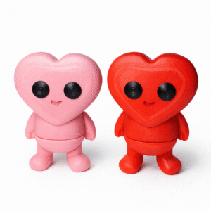 Love Buddy Desk Toy: Pink and red heart-shaped toy figures.