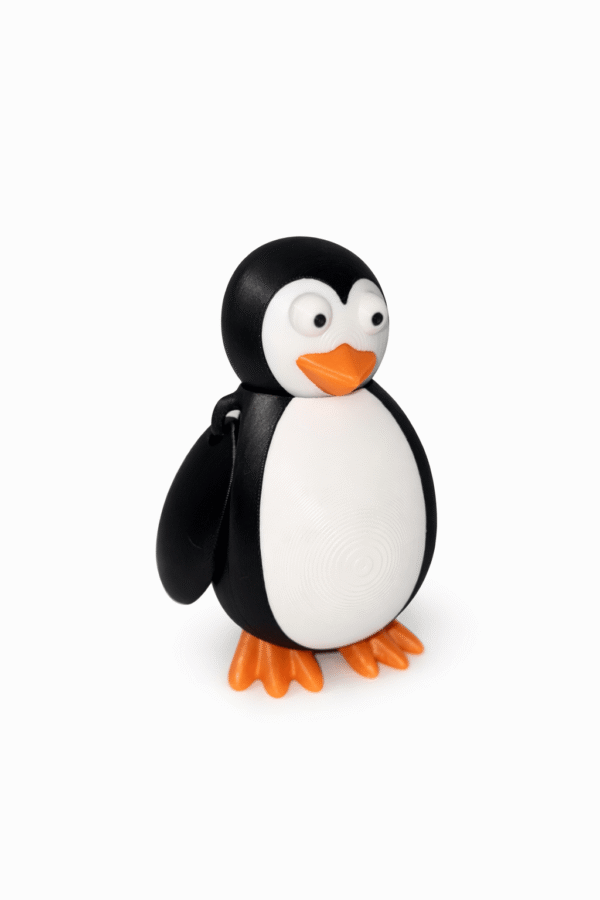 Cute 3D printed penguin figurine with black and white body, orange beak and feet.