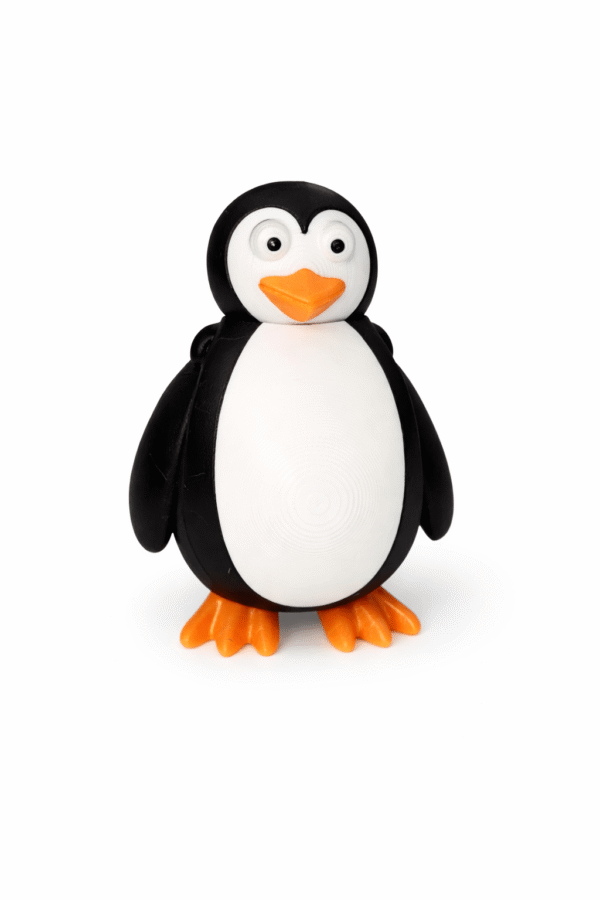 Penguin figurine with black and white body, orange beak and feet.