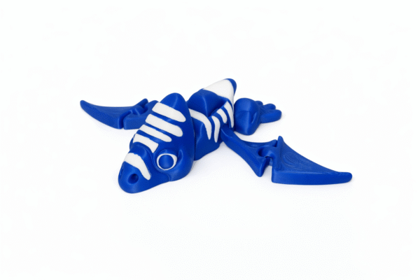 AUTO-DRAFT: Blue and white dragon toy figure.