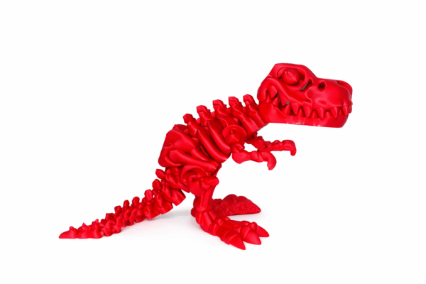 Red dinosaur toy with skeletal design.