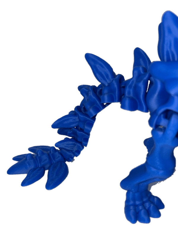 Blue Stegosaurus toy with articulated tail and legs