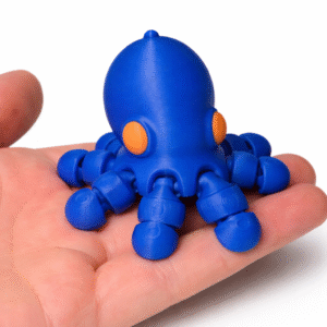 Blue 3D printed octopus toy with orange eyes in a hand