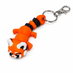 3D printed red panda keyring with a segmented body and metal clasp.